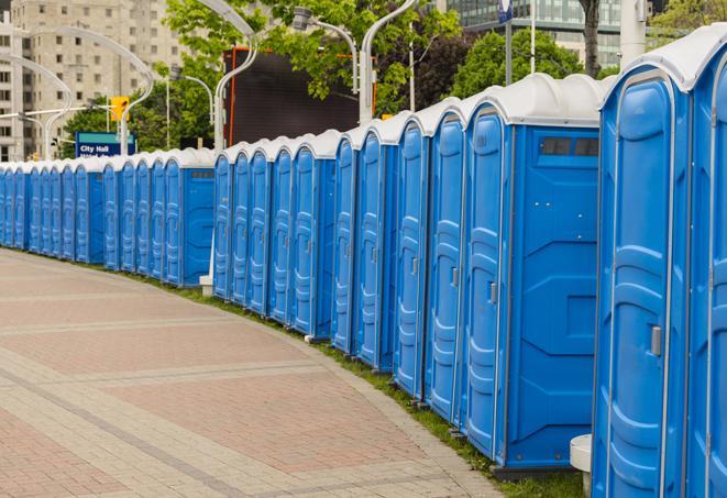 handicap accessible portable restrooms with plenty of room to move around comfortably in Somerville